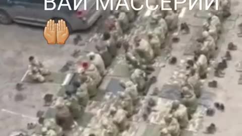Chechen soldiers make a pray before going to battle