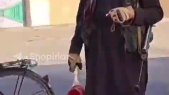 Taliban GAI This GAI has no tablet or certificate in hand, just a gun)