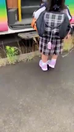 She patiently waits for school bus every morning by herself