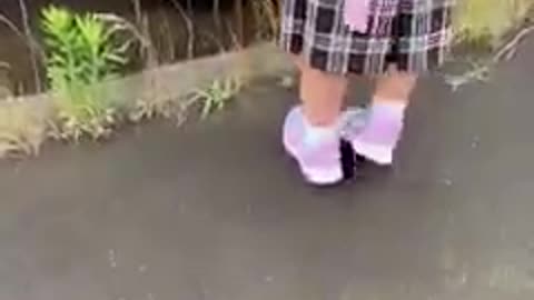 She patiently waits for school bus every morning by herself