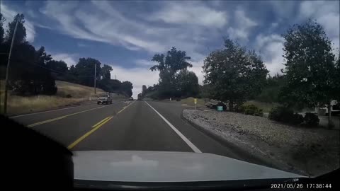 Car Drifts into Other Lane Causing a Roll Over