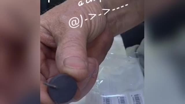 A magnet sticks to a micro chip inside of a Needled