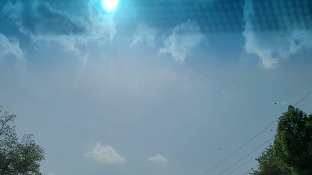 The sun seen while driving