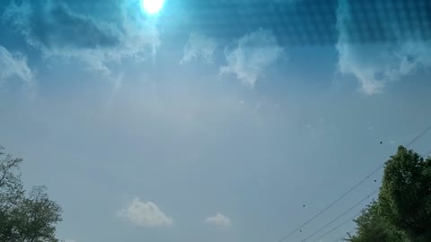 The sun seen while driving
