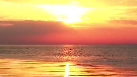 The sunset glow by the sea is beautiful
