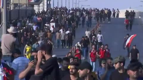 Protesters storm parliament building in Baghdad