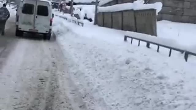 The moment of the avalanche, covered people, Elbrus, Dombay