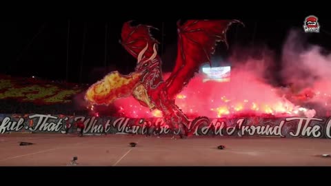 a very beautiful 3D tifo of a dragon with a crazy atmosphere