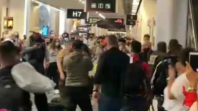 Officer attacked at Miami International Airport.