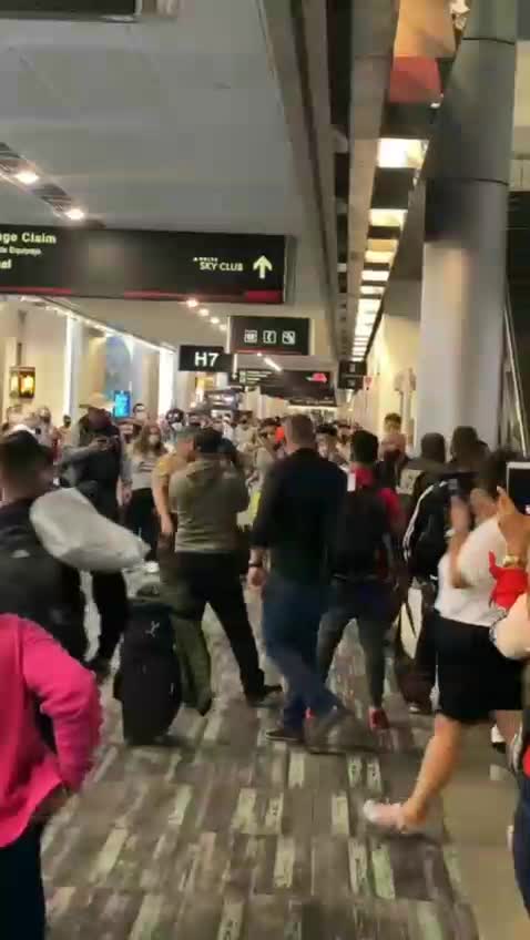 Officer attacked at Miami International Airport.