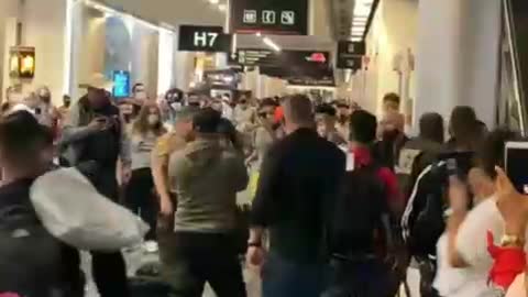 Officer attacked at Miami International Airport.