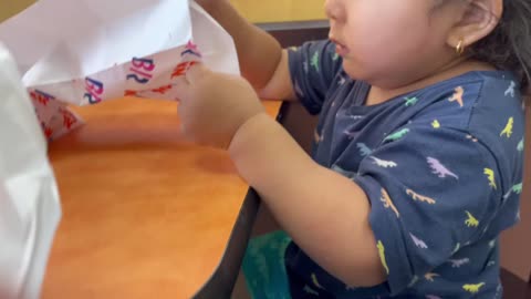 Kid got surprised when he got his favorite Donuts