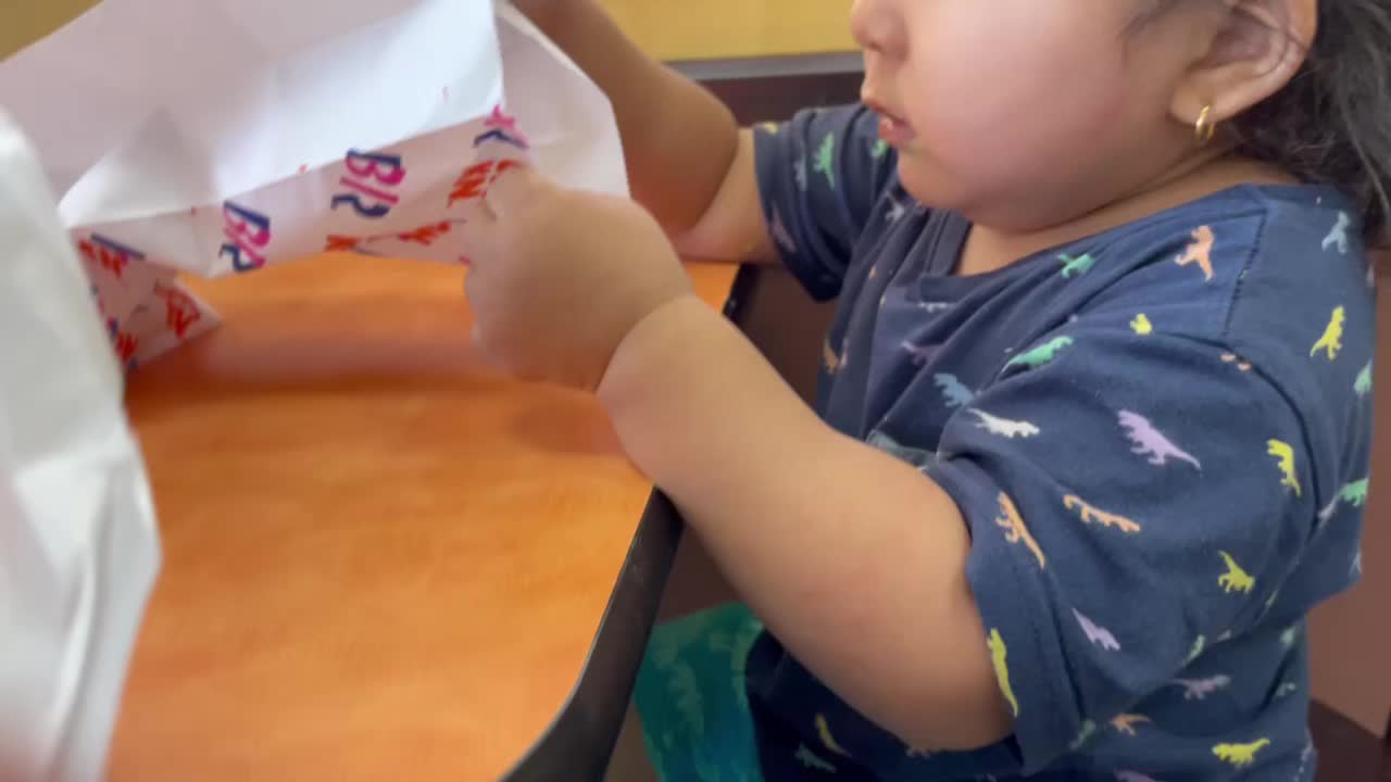 Kid got surprised when he got his favorite Donuts