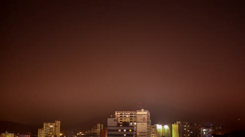 Stars visible behind the night fog