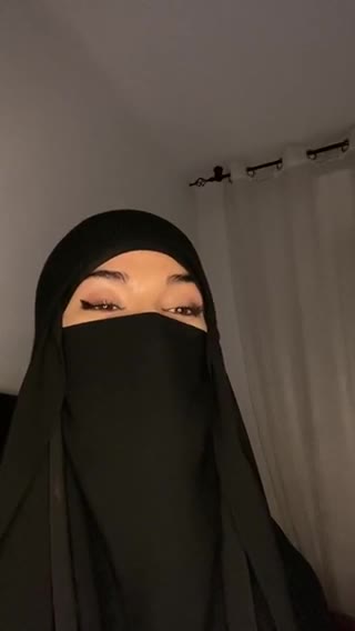 A Muslim woman sings with a beautiful voice