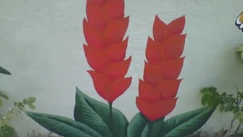 Bonita flor vermelha desenhada na parede da floricultura, lindo trabalho de arte [Nature & Animals]