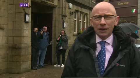 Reporter heckled