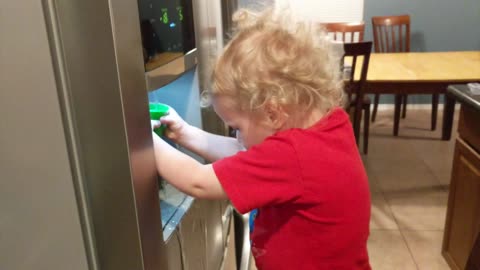 Funny Baby Caught In The Act Opening The Fridge