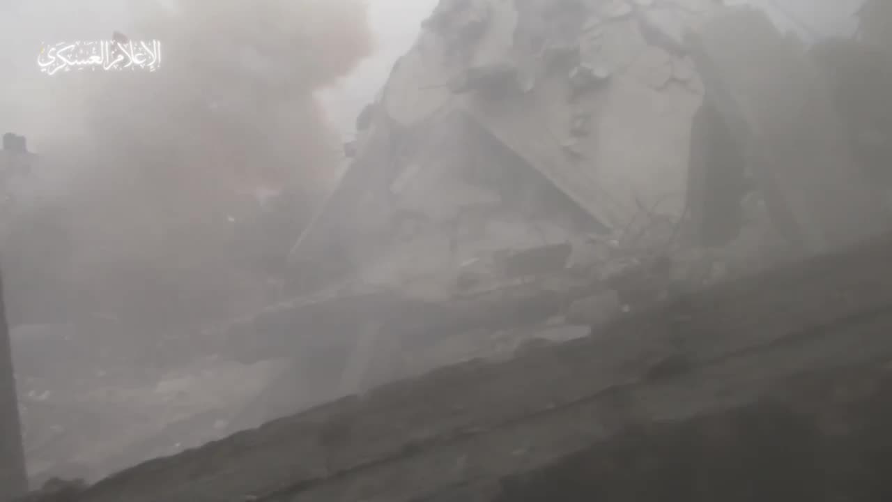 Hamas fighters fire RPGs at Israeli armored vehicles