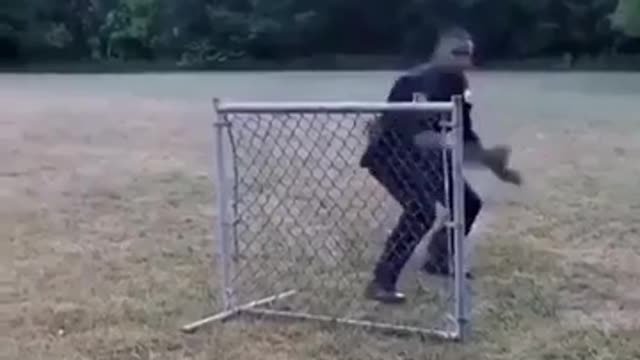 Funny a cop performing different ways to jump a fence.(Cute Video)