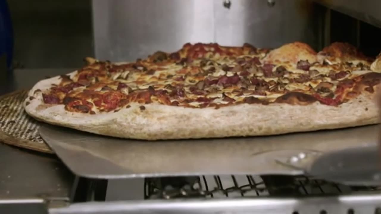 The Biggest Pizzas Ever Eaten On Man V Food