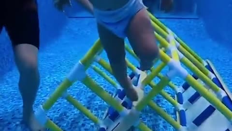 cool Baby learning to swim