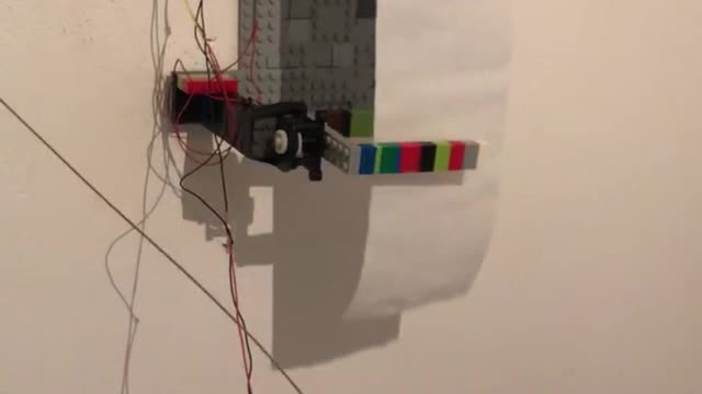 Wall Mounted Automatic Toilet Paper Dispenser Made From LEGO