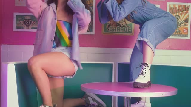 Two girls having fun in a retro restaurant