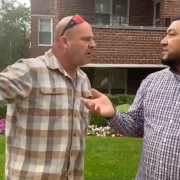 Migrant man destroys posters of Israeli civilians kidnapped by Hamas.