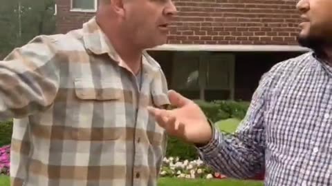 Migrant man destroys posters of Israeli civilians kidnapped by Hamas.