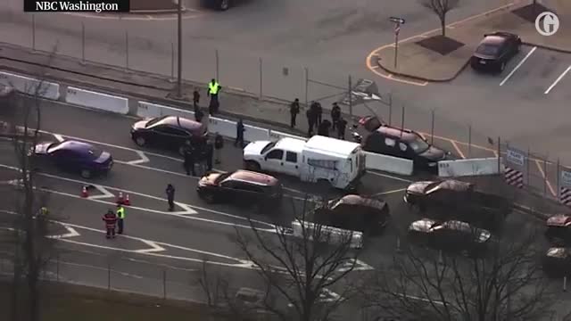NSA shooting_ SUV with bullet holes seen from helicopter