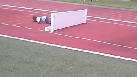 Young Boy Gets Extremely Psyched Up For Hurdle Before Wiping Out