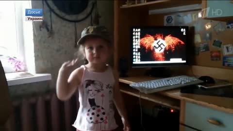 Ukrainian little girl gives Nazi salute and vows to cut Russians.