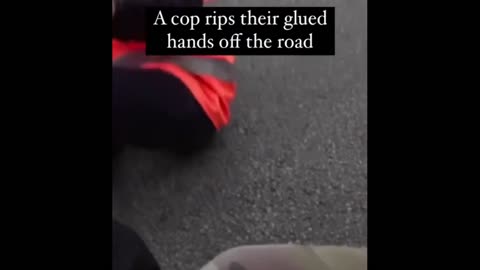 French Cop Deals With Eco-Nuts Glued To The Road The Painful Way