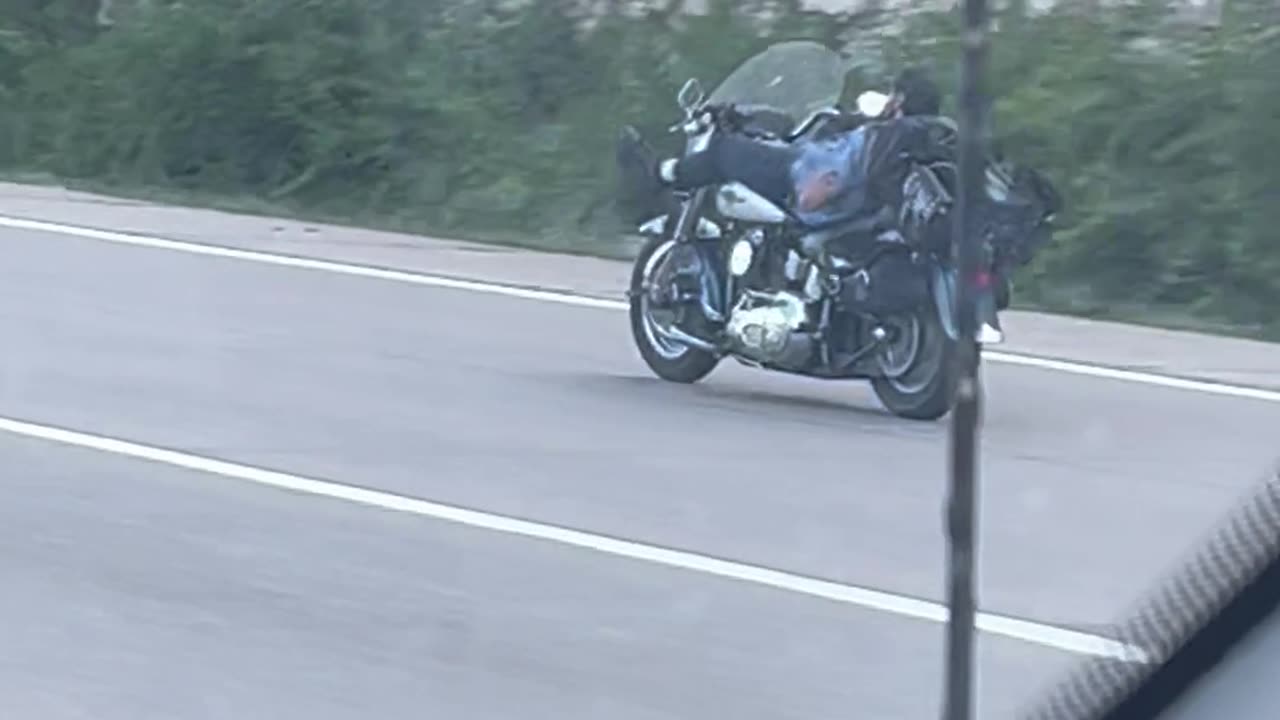 Motorcycle Rider Reclines Comfortably on the Highway