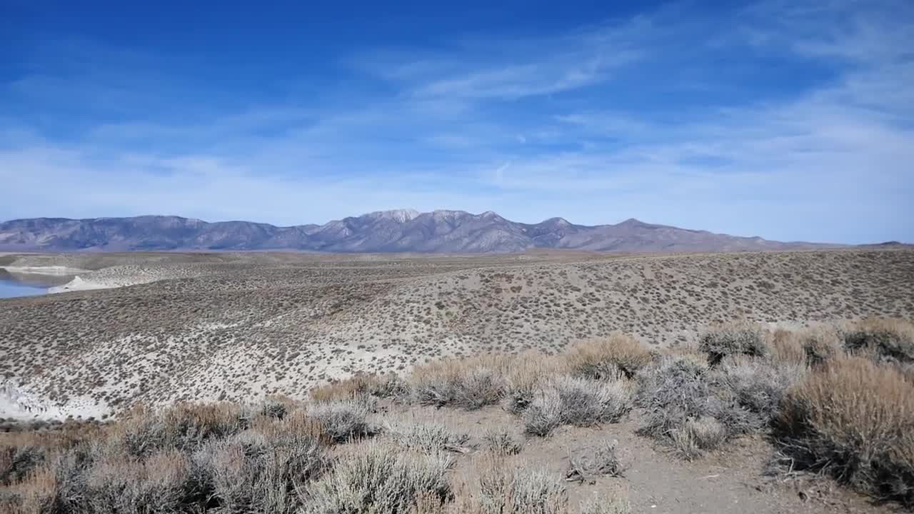 Scenic View of Lake Crowley & Sierra Nevada Snow Capped Mountain Range - Mono County, CA