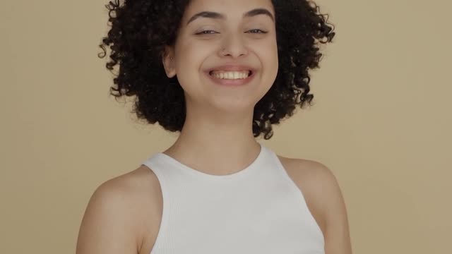 a-woman-smiling-for-the-camera