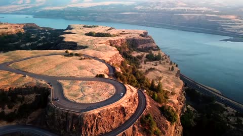 A Long And Winding Road Going Up The Mountain Rock Plateau