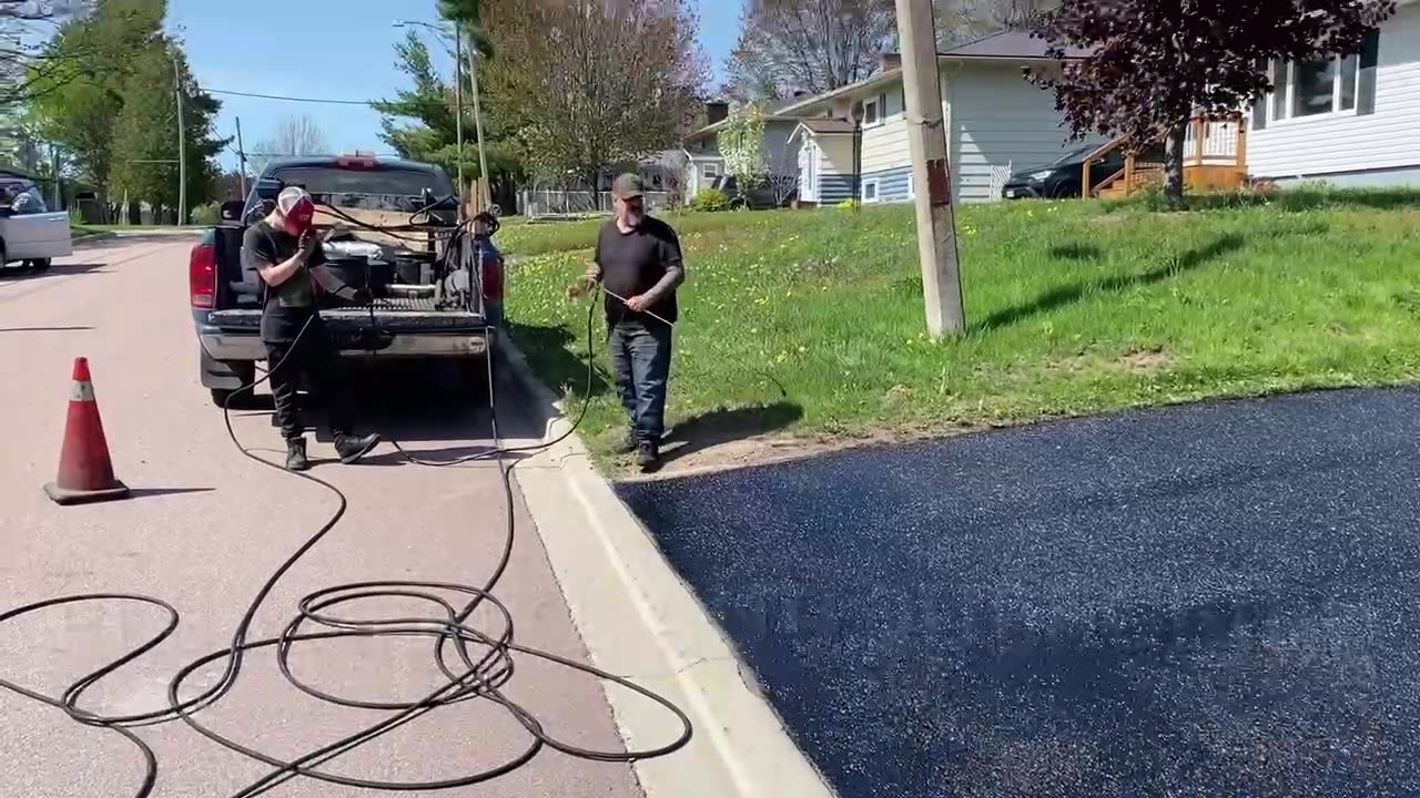 Professional Asphalt Spray Sealing: “The Late Afternoon Seal One” Top Coats Pavement Maintenance