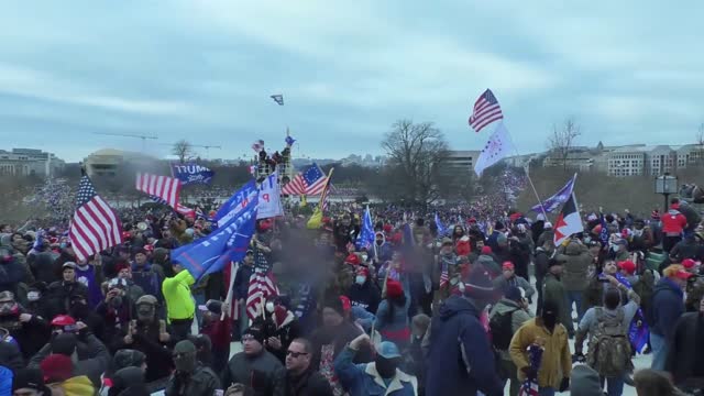 Patriots battle Capitol police inside the building