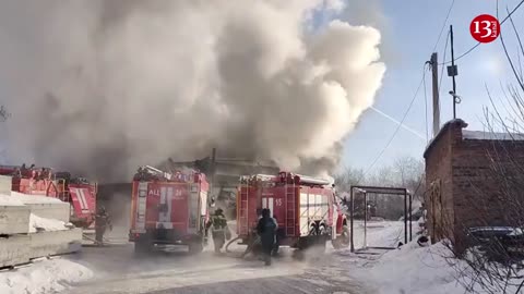 Image of a massive fire in a Russian warehouse where food and metal products are