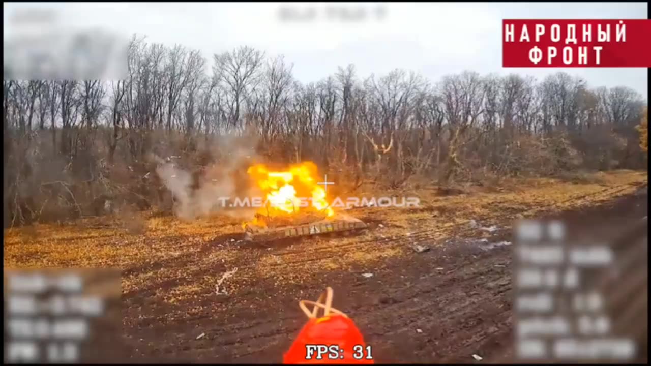 A Russian drone takes out a burning Ukrainian T-64 tank in the Kursk region.