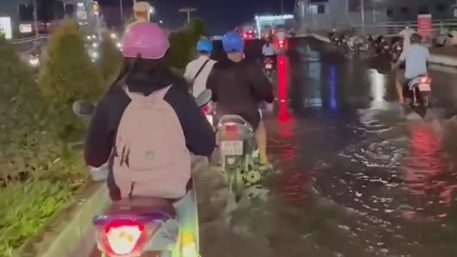 High tide floods the streets of Vietnam.