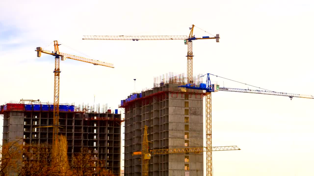 Cranes on building construction site