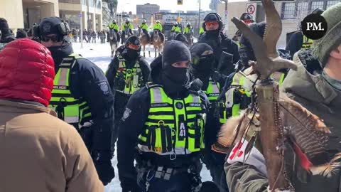 Police drag away a Freedom Convoy protesters and proceed to beat the individual.