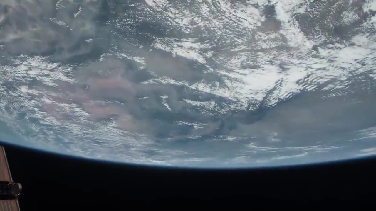 "Earth's Elegance: A Glimpse from Space"