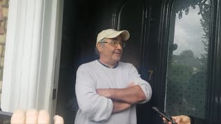 Danny Baker at his door responds