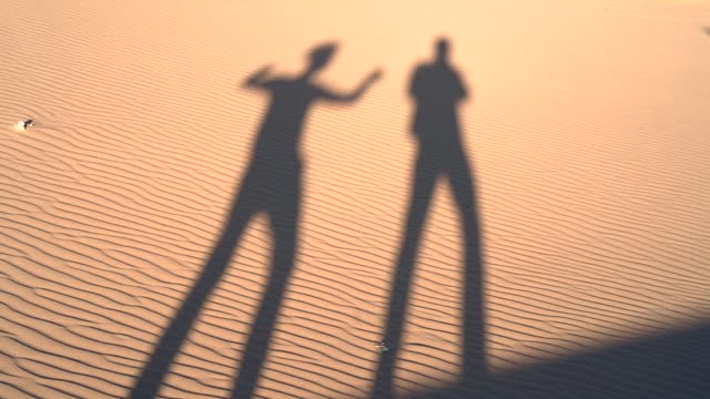 Youngsters Hilariously Enjoying Shadow dance in Dessert