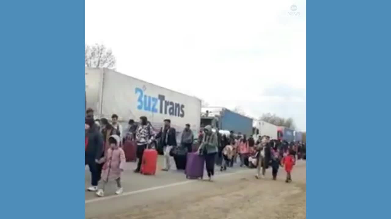 Refugees gather to flee from Ukraine to Romania amid Russian invasion