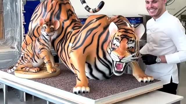 Chef makes detailed sculpture of chocolate tigers